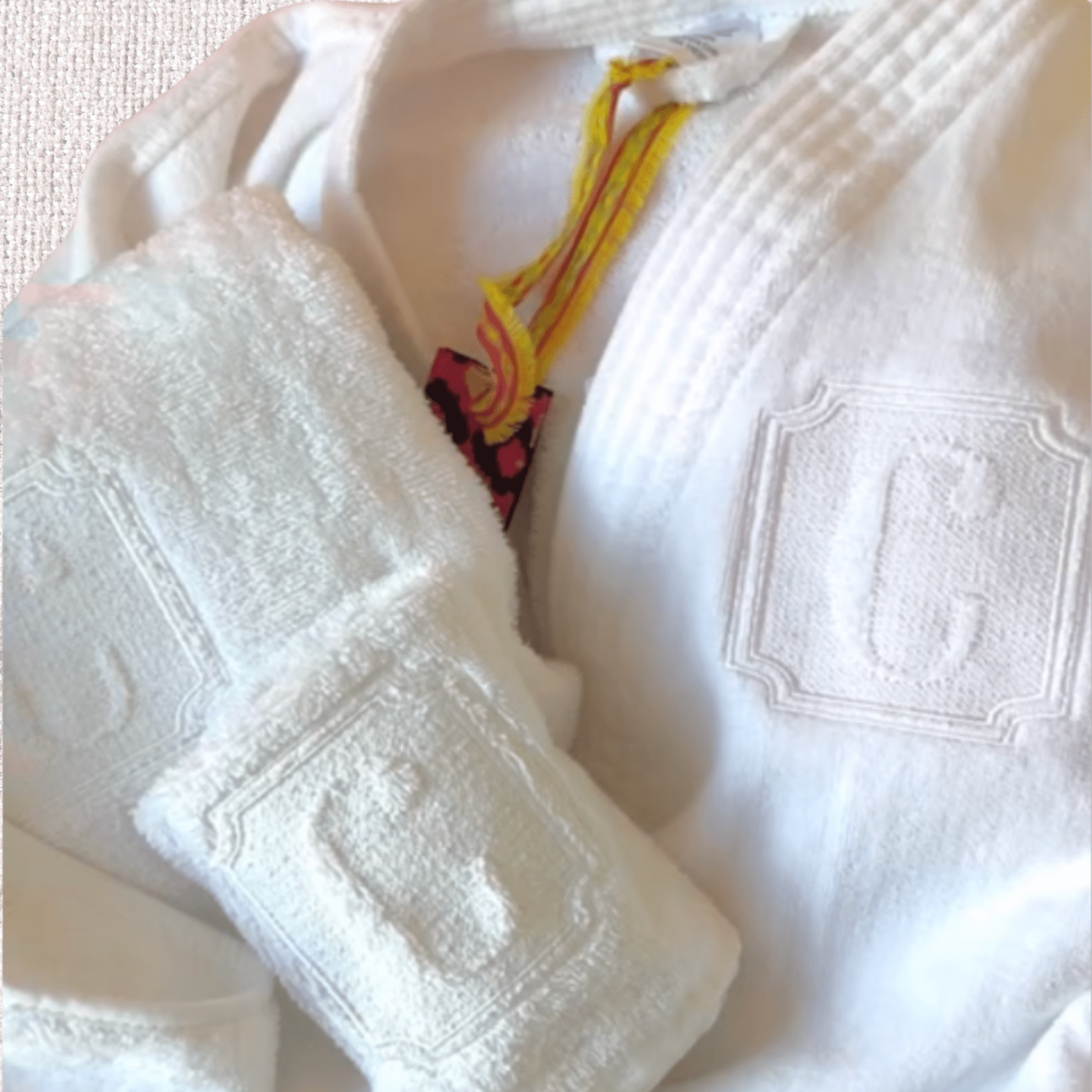 Monogrammed robe and towel set with hotel/spa style initial. Great gift set at 10Bay.store.